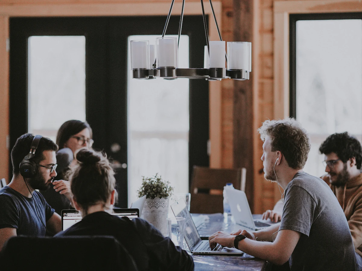 Designers and clients talking around a table